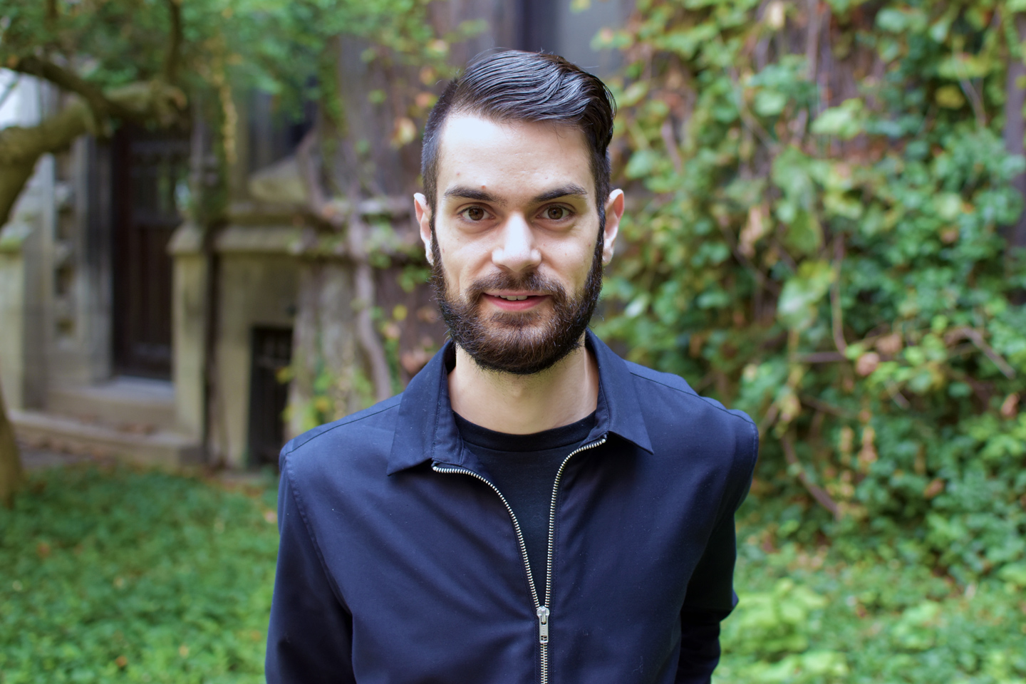 portrait of Carlo Diaz, taken on the University of Chicago campus in September 2020