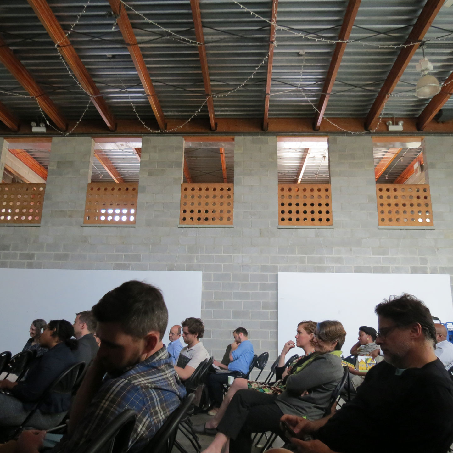 audience members listen at the Salvage 3.0 symposium