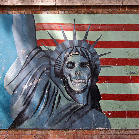 mural featuring skeleton statue of liberty against an American flag