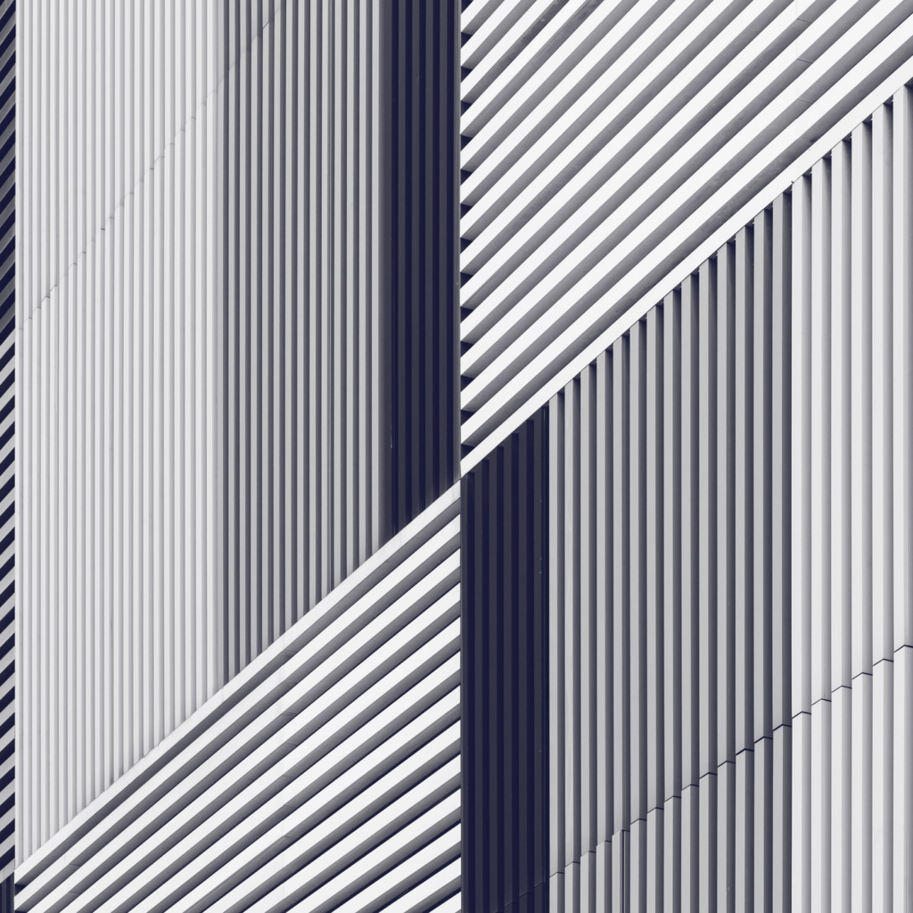 geometric arrangement of navy, gray, and white lines