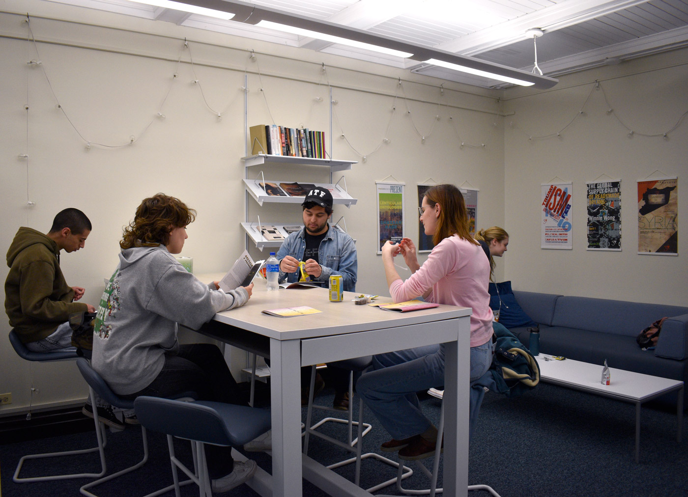 Group of people casually sitting around a table